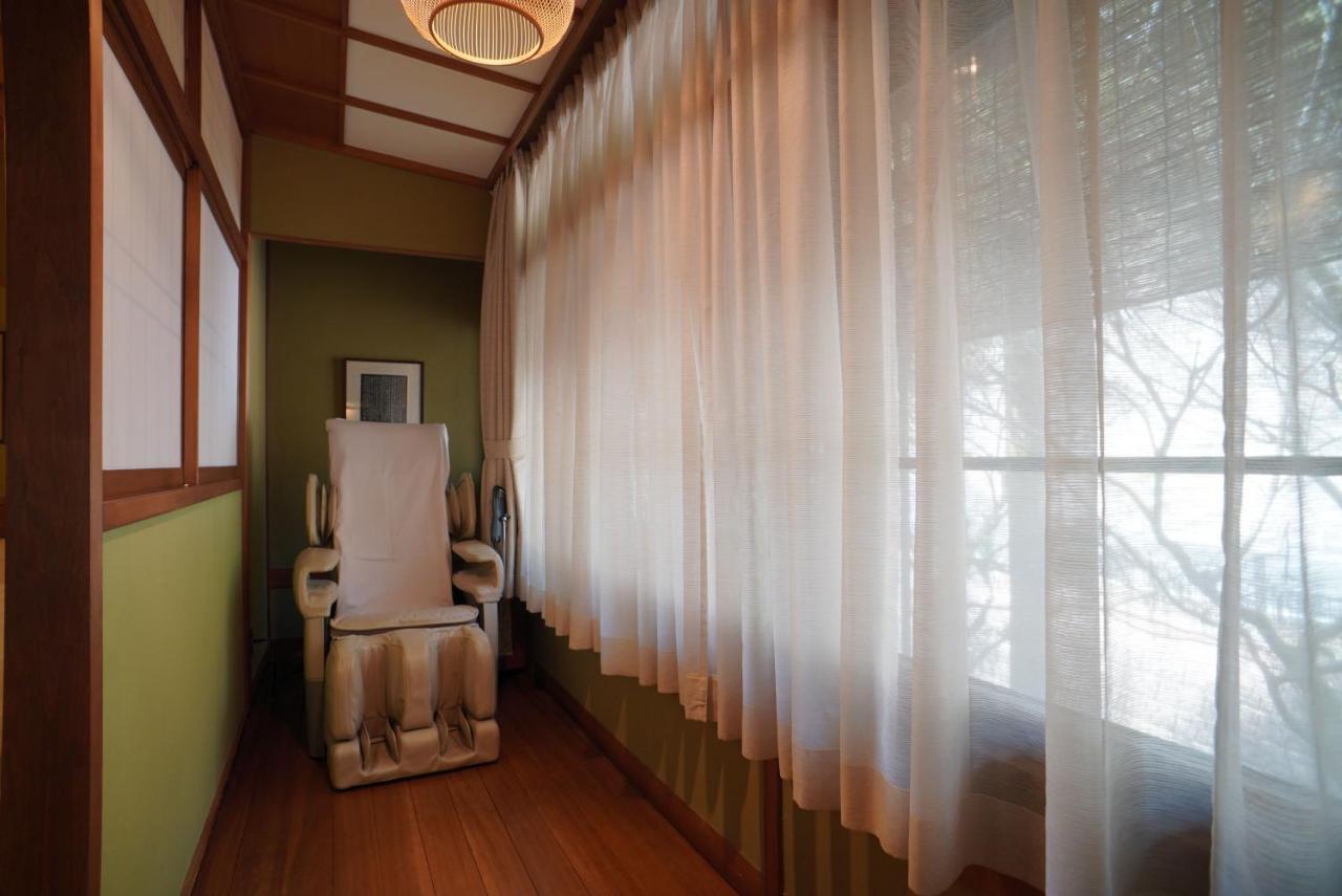 Arima Onsen Tocen Goshobo Hotel Kóbe Kültér fotó A room at a Japanese onsen